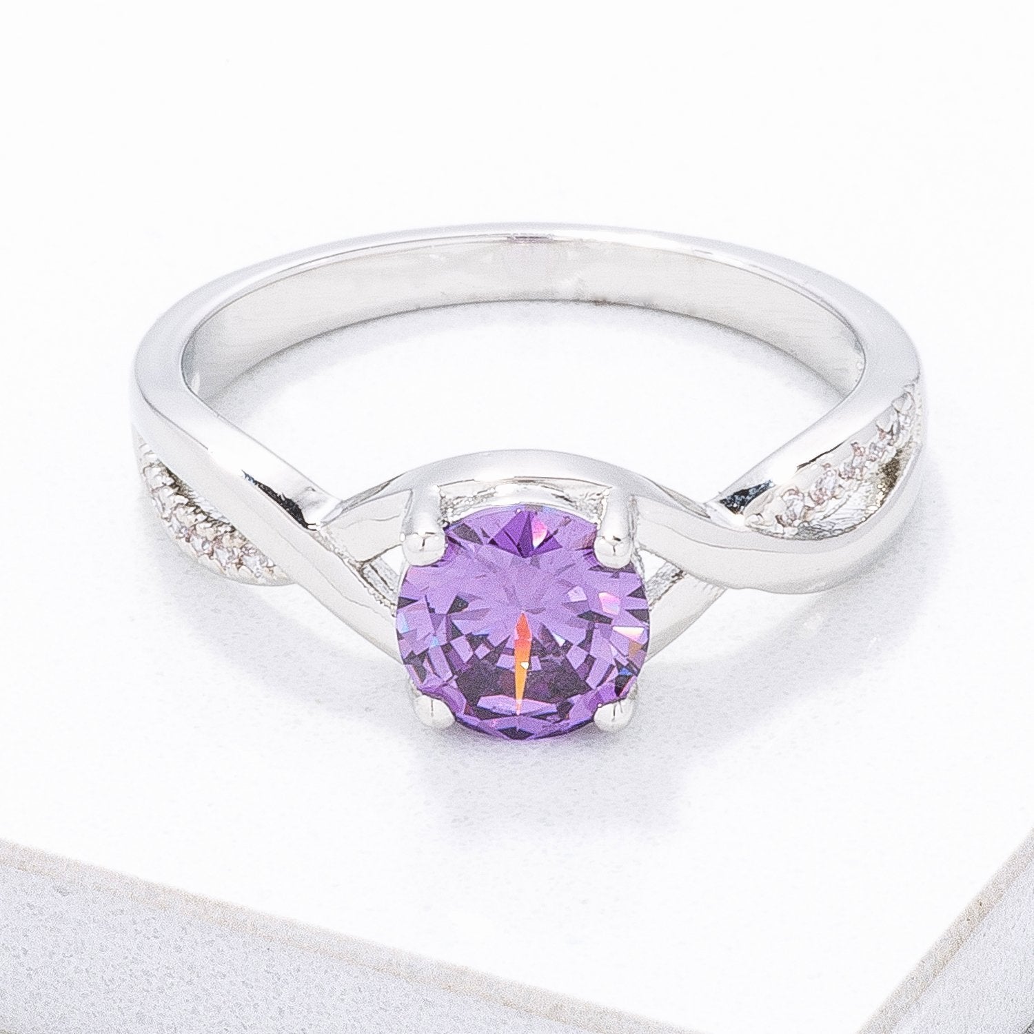 Simply Beautiful Twisted Purple CZ Ring